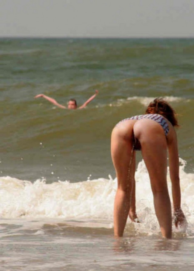 Nudist Pissing On The Sea