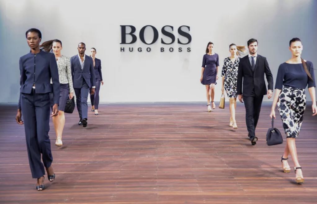 Дизайнер одежды босс 4 буквы. Hugo Boss бренд. Хьюго босс компания. Коллекция Хьюго босс. Последняя коллекция Хьюго босс.