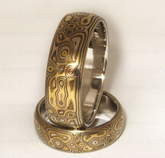 Обручальное кольцо из меди и железа.