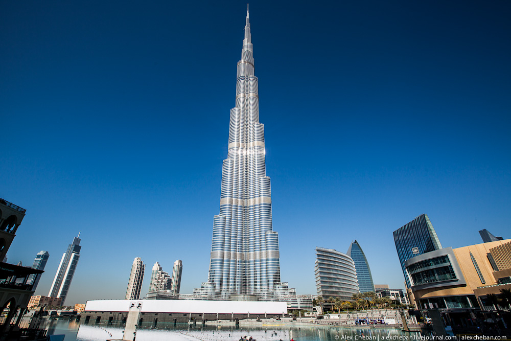 Бурдж халифа триколор. Бурдж Халифа 124 этаж. Небоскребы Дубая. Бурдж-парк фото с крыльями. Университет Халифа фото.