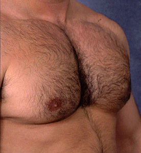 Большегрудый мужик. Широкая мужская грудь. Самая большая мужская грудь. Большая волосатая мужская грудь.