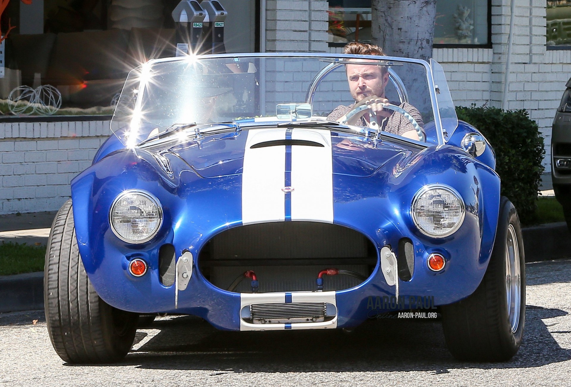 17550372 The Hollywood actor Aaron Paul's latest passion is his 1965 Shelby Cobra.