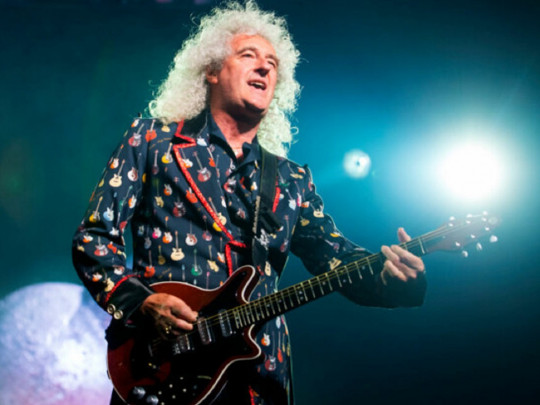 Гитарист Queen попал в больницу с «разорванной в клочья» ягодицей