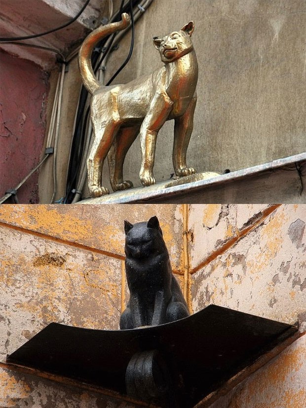 Кот и статуя