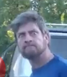 Сумашедший с кирпичем