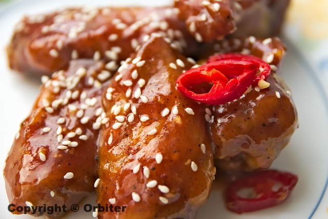 Острые куриные крылья в кисло-сладкой глазури