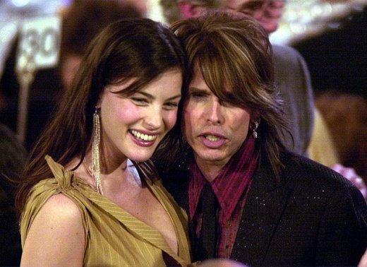 12 знаменитых отцов, которые без ума от своих детей