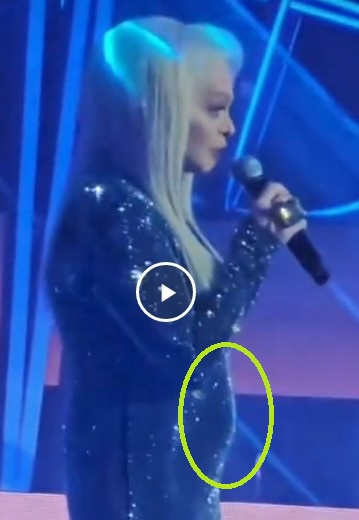 Она еще и поет