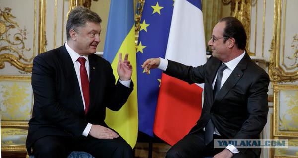 Порошенко и Путин пожали друг другу руки