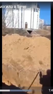 Братская могила в городе Буча.
