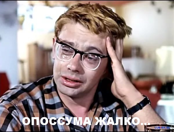 Фото висящего вниз головой питона с опоссумом в зубах шокировало туристов