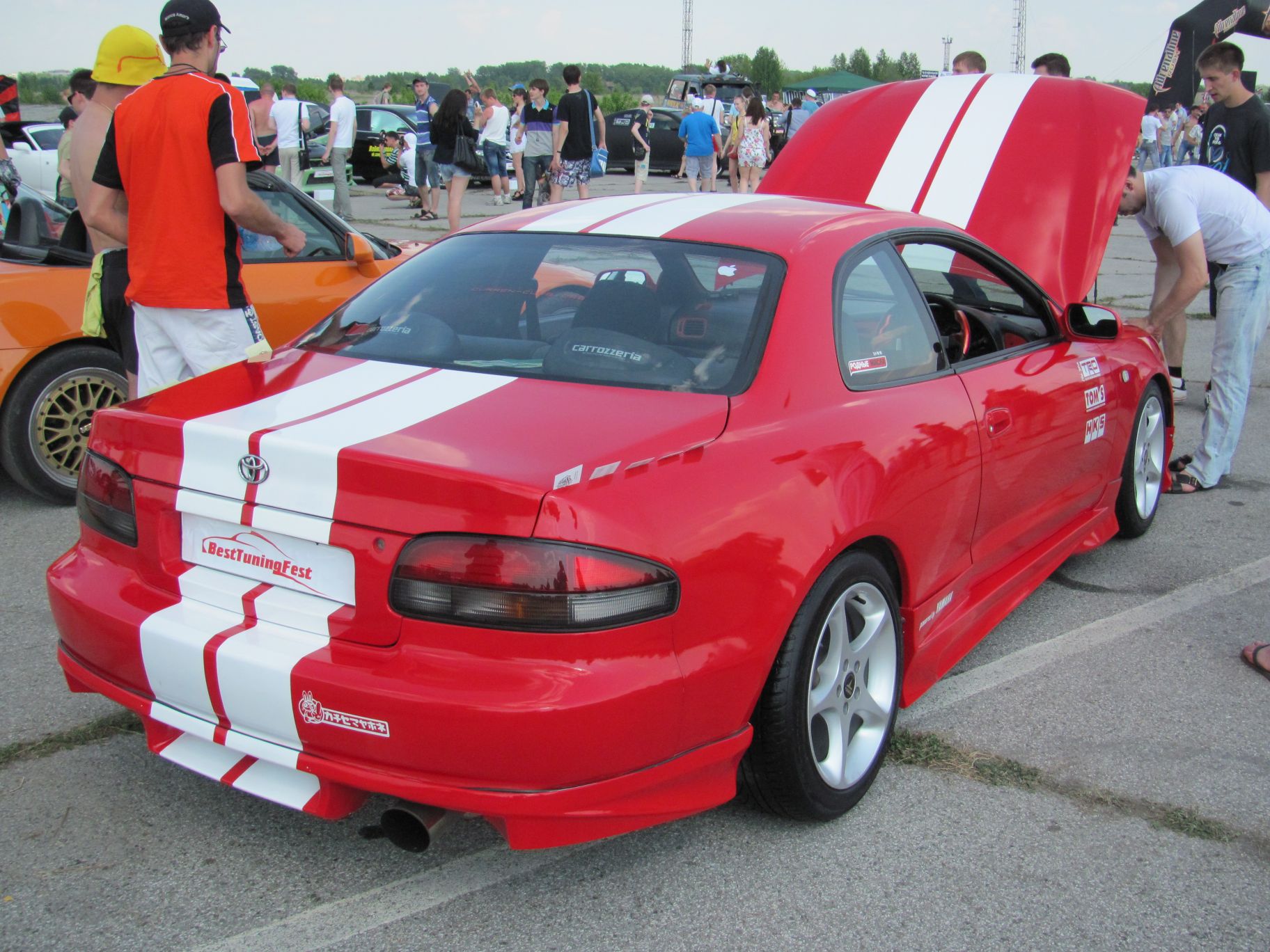 Фестиваль тюнинговых авто. Обвес галлардо тойота селика. Besttunings. Бест тюн машина. Машина "best tune t 33".