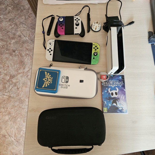 Продаю Nintendo switch oled 64gb с играми
