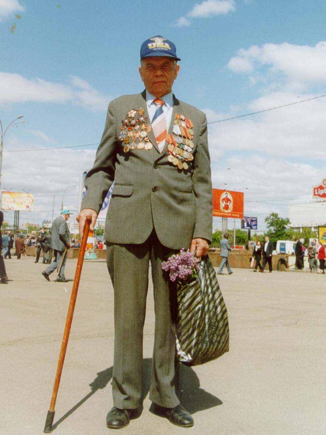 Фотографии простого солдата снятый на  камеру "Лейка".