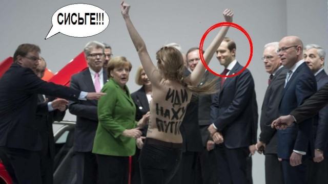 FEMEN показали Путину и Меркель голые груди:))