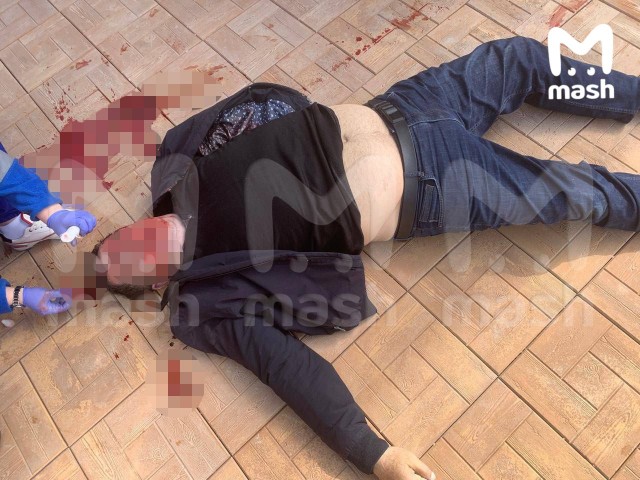 Человек в костюме химзащиты ОЗК застрелил криминального авторитета