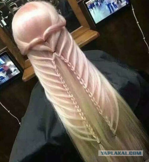 Показалось. Снимок демонстрирует нам образец сложной причёски с косами