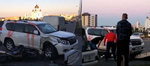 Мотоциклист и Land Cruiser Prado