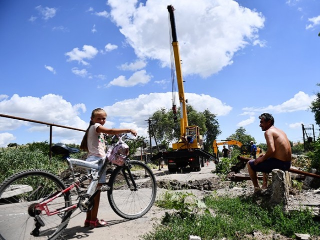 Путин: вся Россия поможет восстановить ДНР и ЛНР