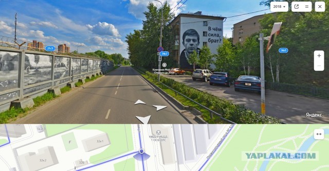 Портрет Сергей Бодрова на фасаде дома 34 на Кременчугской улице в Москве