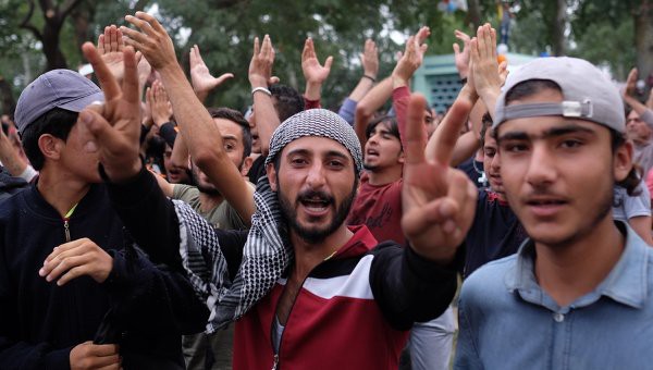 Меркель осудила указ Трампа о беженцах