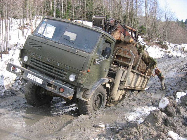 КамАЗ засосало в дорогу!