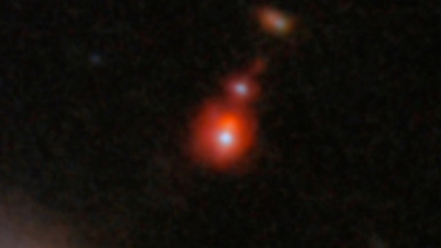 Астрономы обнаружили слияние самой отдаленной пары сверхмассивных черных дыр на сегодняшний день