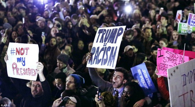 "Анти-Трамп": десятки тысяч протестующих выступают по всей Америке, реагируя на победу Трампа