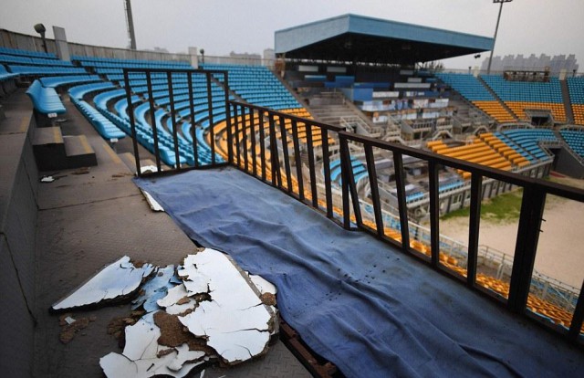 Через десять лет на стадионах Олимпийских Игр в Пекине растут деревья, а талисманы догнивают под открытым небом