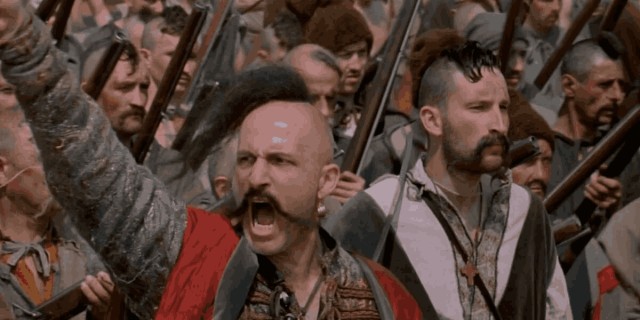 Зачем запорожские казаки носили чуб на бритой голове? Почему над этой прической так смеялись русские?