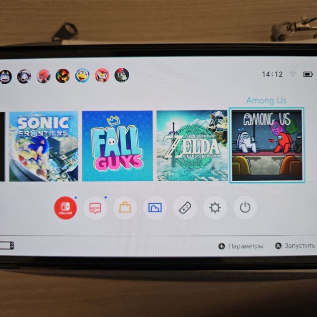 Продаю Nintendo switch oled 64gb с играми