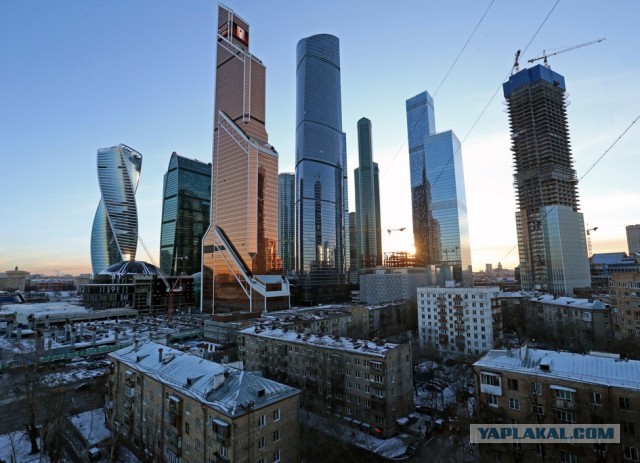 Москвичи
