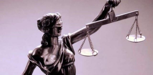 Подмосковного прокурора обвинили в получении взятки земельными участками