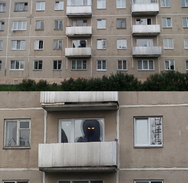 Это всего лишь тень от "тарелок" на крыше и включенная люстра в квартире
