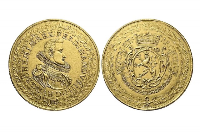 Золотая монета в 350г  на аукцыоне