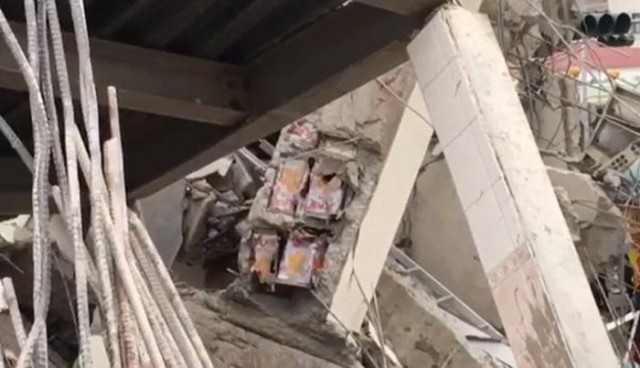 Дом, рухнувший во время землетрясения на Тайване, был построен из банок масла